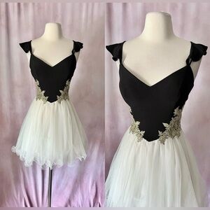 Elegant Black and White Midi Dress